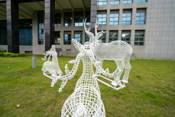 Metal hollow deer sculpture