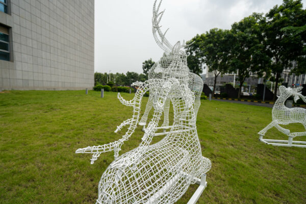 Metal hollow deer sculpture