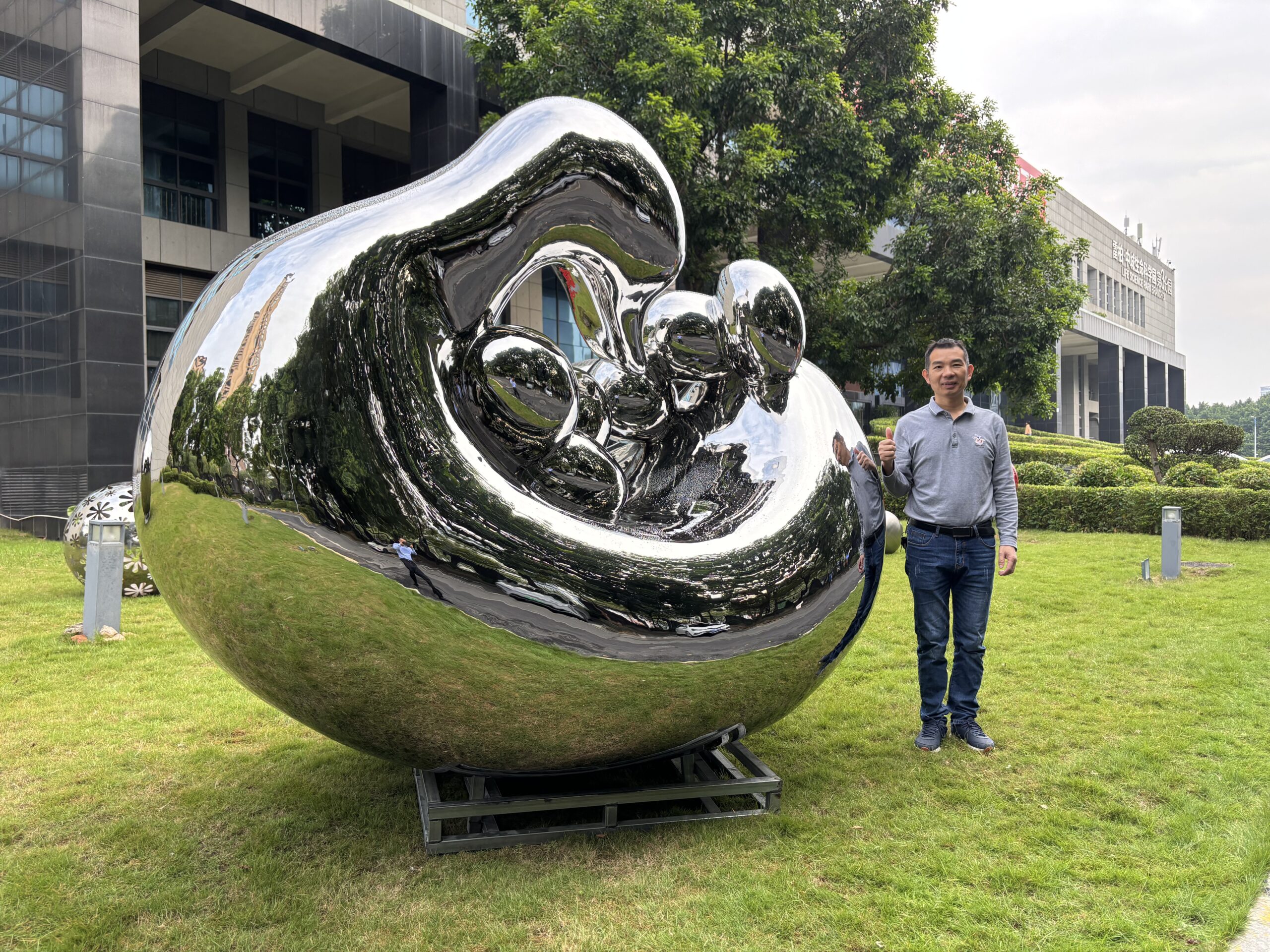Mother Swan with Baby Sculpture